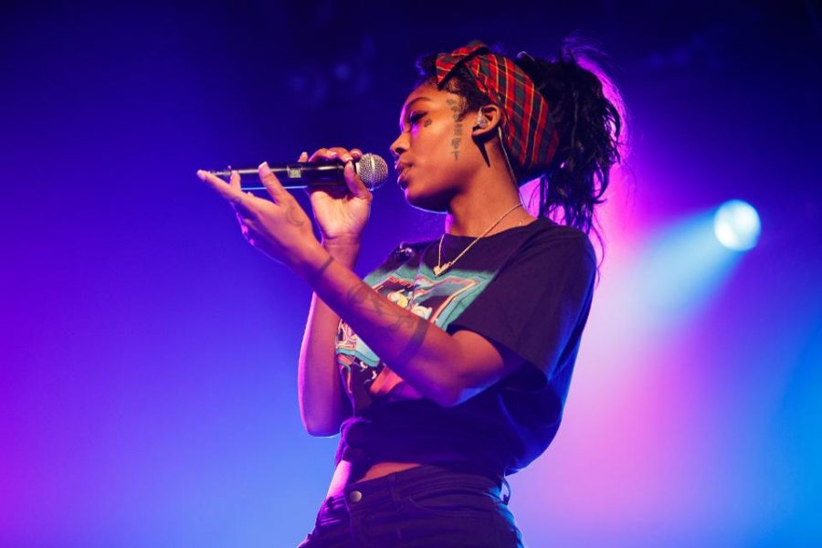 Summer Walker performing on stage in October 2018. Walker has recently released a new R&B album. 