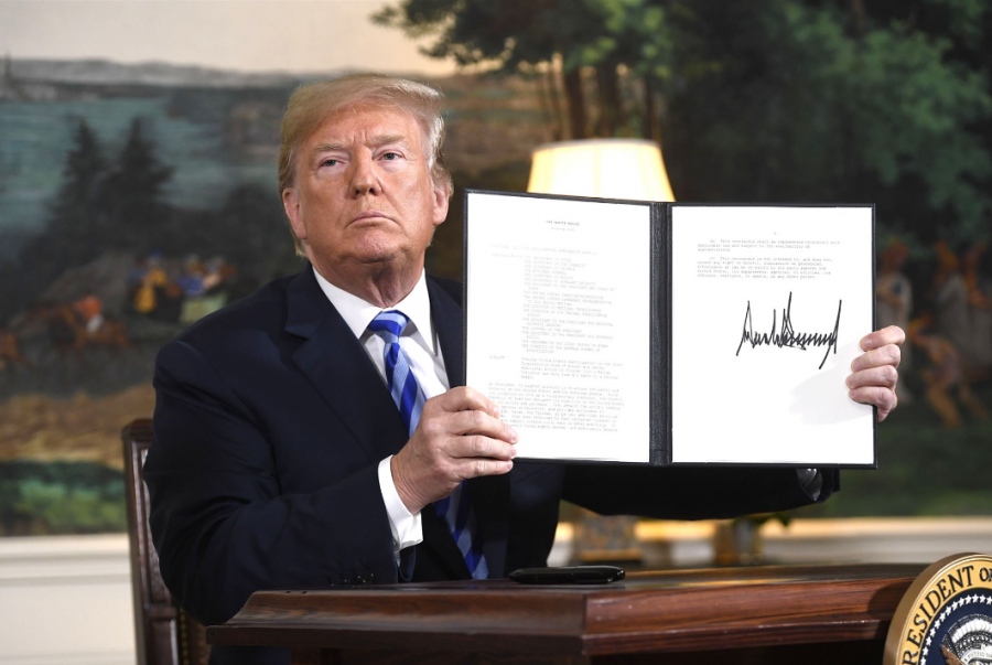 President Trump signs doctrine to withdraw from Iran nuclear deal. 