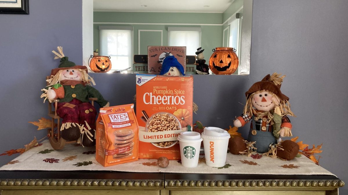 My array of pumpkin-spice products, amongst my very festive cabinet.  