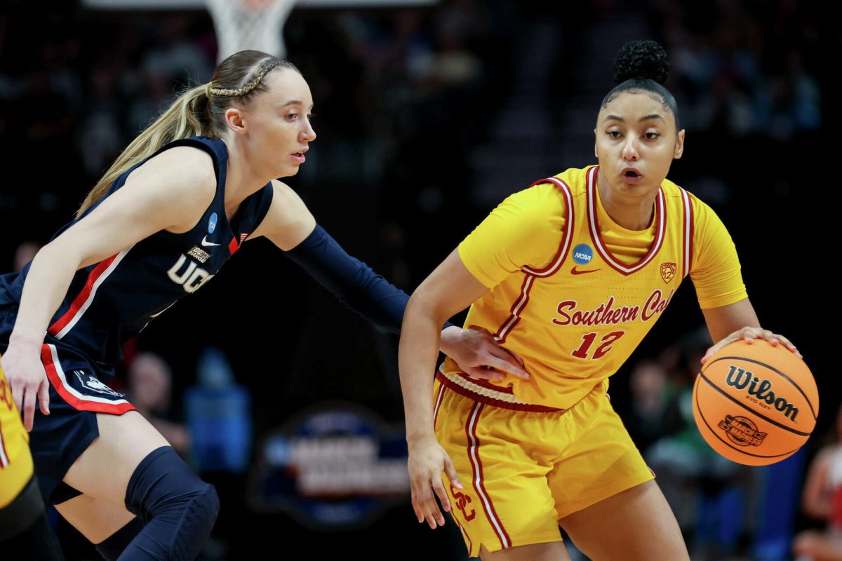 Paige Bueckers and Juju Watkins facing off in the 2024 Elite 8